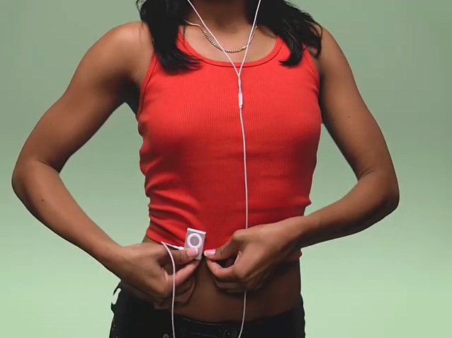 person clipping iPod Shuffle onto clothing - Apple posts new iPod shuffle ad - Ars Technica