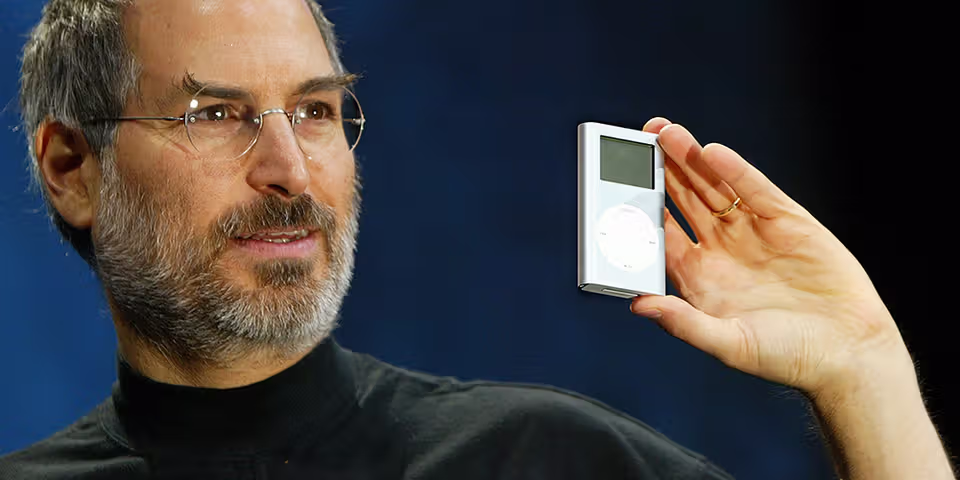 person listening to music on iPod Mini - Apple iPod: A Retrospective About How it Changed Music | Hypebeast