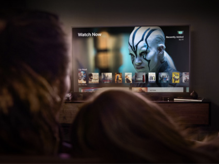 Person watching Apple TV on iPad - Apple Tv Watch Peacock On Ipad Apple TV 4K Roku Ultra: Which High ...