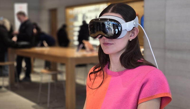 woman wearing Apple Vision Pro - Apple Vision Pro Ushers Brands into Era of Spatial Computing ...