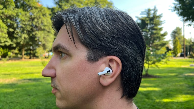 person wearing Apple AirPods Pro in ear - Headphones Right Way To Wear Airpods Pro The Best Apple Headphones ...