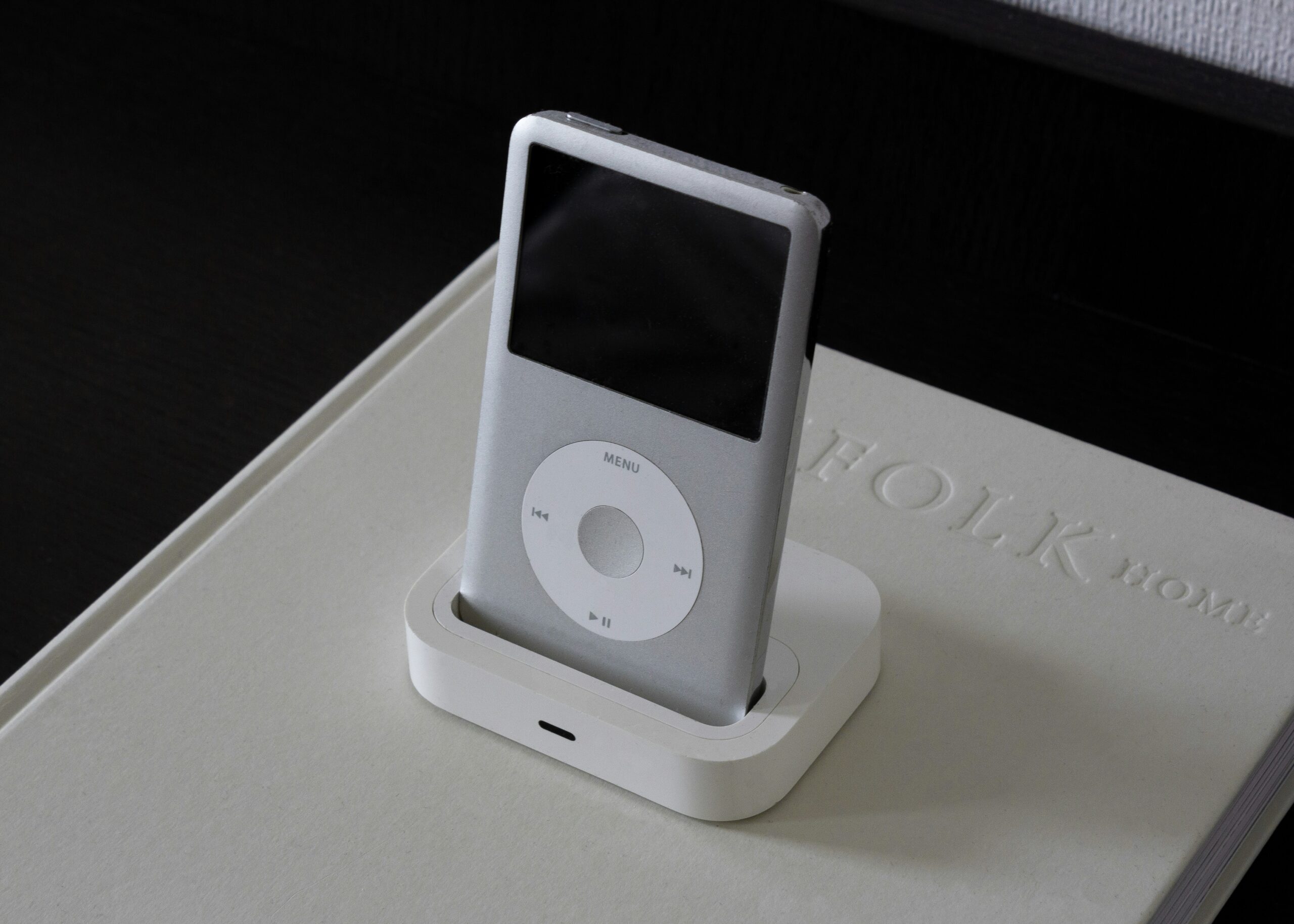 modern iPod concept render - iPod Classic placed on a Kinfolk book.