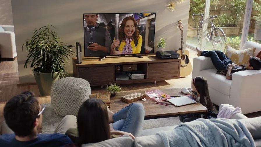 family watching streaming service in living room - Netflix, Hulu, Other Streamers Trounce Pay TV on Customer Satisfaction