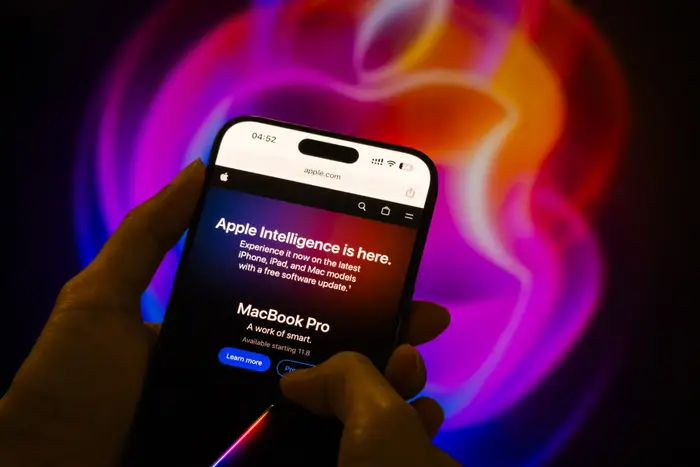 iPhone showing new iOS update - Apple's iPhone Update Brings New AI Features - Business Insider